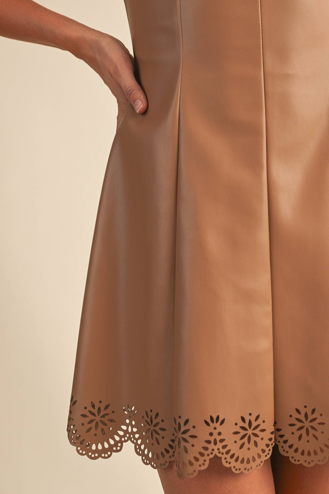 Faux leather laser cut scallop hem mini dress